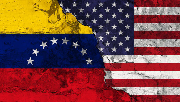 shutterstock_1897556977.jpg featured image Cracked Venezuela and USA flags side by side