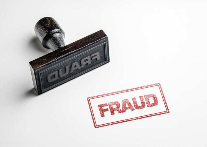 shutterstock_1019053357.jpg featured image Fraud stamp and red stamped imprint on paper