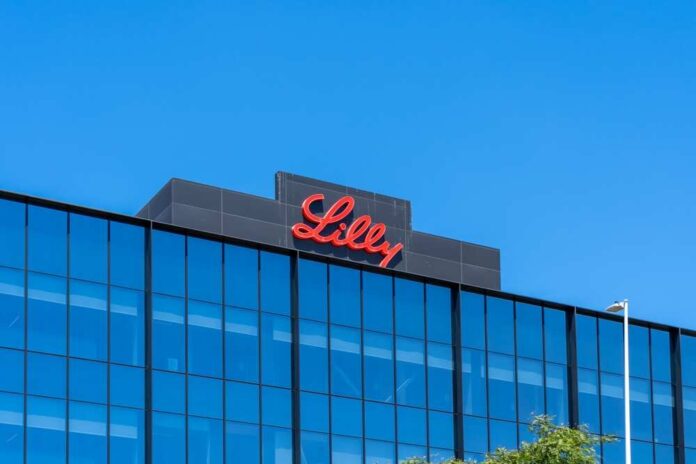 shutterstock_2179444731.jpg featured image Lilly logo on a modern glass building rooftop