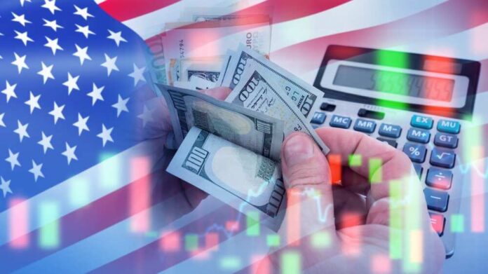 shutterstock_2482828605.jpg featured image USA flag calculator and hands holding dollars overlapping