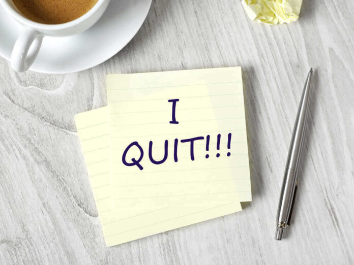 shutterstock_718986055.jpg featured image Note with I QUIT near coffee, pen, paper ball.