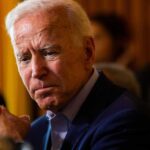 Joe Biden solemn, thinking.