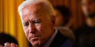 Joe Biden solemn, thinking.