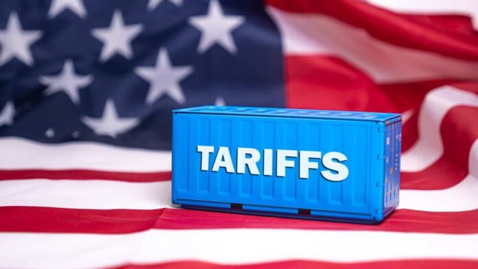 shutterstock_2593025849.jpg featured image Shipping container reading tariffs on the American flag