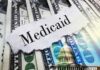 Medicaid text over cash and capitol building