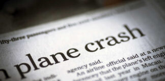 Newspaper headline about a plane crash.
