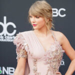 Taylor Swift in ornate dress.