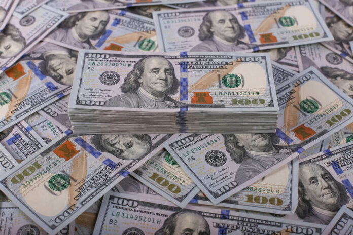 shutterstock_1257954658.jpg featured image Stack of one hundred dollar bills, Benjamin Franklin's portrait.