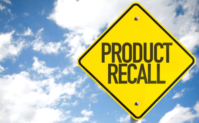 shutterstock_419918254.jpg featured image Yellow product recall sign against cloudy sky