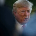 Donald Trump speaking outdoors