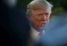 Donald Trump speaking outdoors