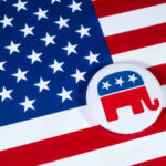 American flag and Republican Party elephant logo button.