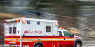 Ambulance driving on a city street