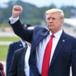 Donald Trump with raised fist