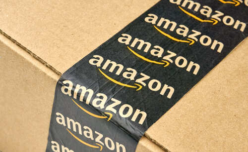 Close-up of an Amazon-branded shipping box tape on a cardboard box
