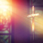 Historic Sistine Chapel Prayer Stuns World Crucifix with sunlight, stained glass window in background