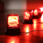 HORRIFIC Hospital Slaughter — Nobody Survived Red emergency lights on dark floor, illuminating the area.
