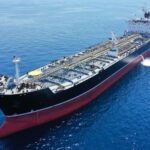 A large oil tanker sailing on calm ocean waters