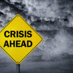Fatal Minneapolis Shooting Sparks New Washington Firestorm A yellow warning sign that reads 'CRISIS AHEAD' against a stormy sky