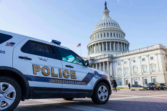 Police vehicle outside United States Capitol building.