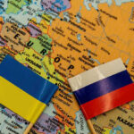 Map with Ukrainian and Russian flags.
