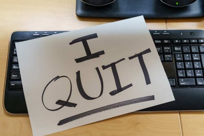shutterstock_2083851748.jpg A resignation letter reading 'I QUIT' placed on a keyboard