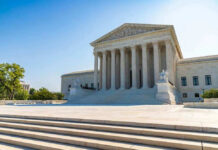 United States Supreme Court building exterior, sunny day.