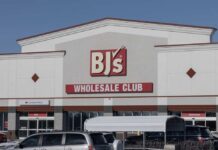BJ’s Slammed By Product Recall Exterior view of BJ's Wholesale Club with curbside pickup sign
