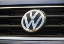 Close-up of a Volkswagen logo on a car grille