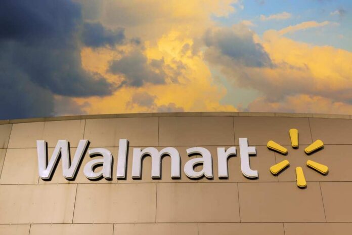 Walmart sign against a cloudy sky
