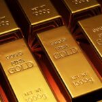 Close-up of gold bars stacked together