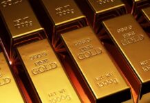 Close-up of gold bars stacked together