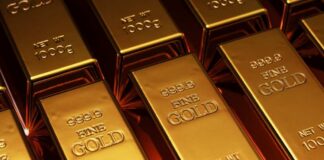 Close-up of gold bars stacked together