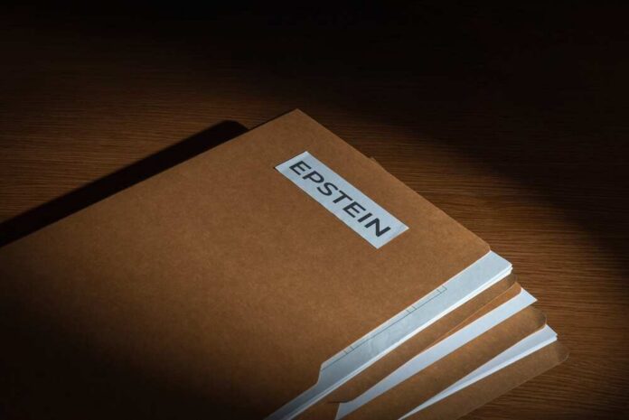 Stack of brown file folders with a label reading 'EPSTEIN'