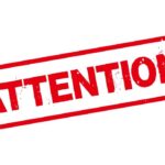 Red stamp with the word 'ATTENTION' in bold letters