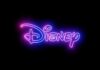 Neon Disney logo glowing against a dark background