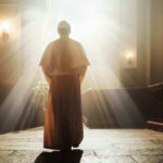 Person in religious attire bathed in sunlight.