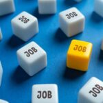 A yellow cube with the word 'JOB' surrounded by white cubes with the same word on a blue background