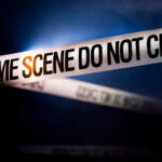 Killer Stored Corpse — Bridge Plan Goes Wrong Police tape reading 'CRIME SCENE DO NOT CROSS' in a dark setting