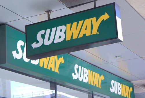Subway restaurant sign displayed prominently