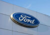 Ford’s Big Move — Blue-Collar Buyers Applaud Ford logo on a buildings exterior wall