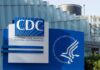 Signage of the CDC building displaying its name and logo