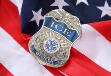 ICE Agent SHOCK: Assault, Lies Exposed? ICE officer badge resting on an American flag