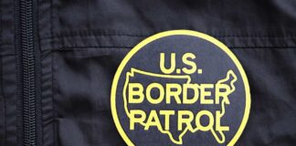 U.S. Border Patrol patch on a black jacket