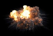 VIDEO: Dead and Missing Workers Following Explosion A large explosion with flames and smoke against a black background