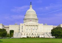 Senate’s Bold Move: Pay Freeze? United States Capitol building with dome and steps