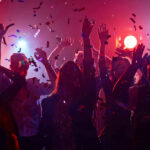 Dance’s Hidden Power for Aging Gracefully People dancing with confetti at a party.