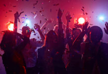 Dance’s Hidden Power for Aging Gracefully People dancing with confetti at a party.