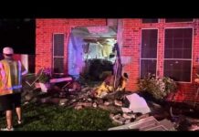 Woman dies after Tesla driver slams into home in Katy area
