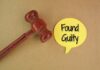 A wooden gavel next to a yellow speech bubble that says 'Found Guilty'